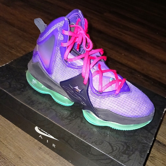 black and teal lebrons